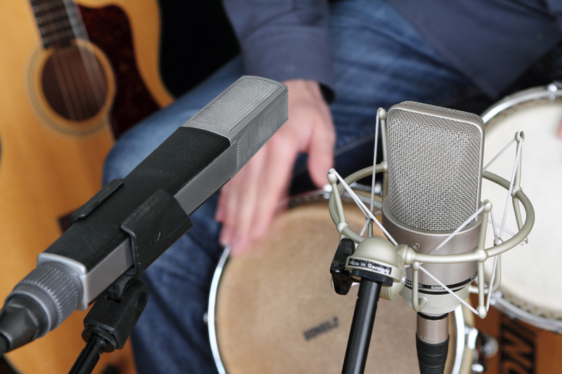 Condenser microphones typically produce much higher output than dynamic mics. The Neumann TLM 103, pictured on the right, is more than 20 dB “louder” than the Sennheiser MD441 (left)!